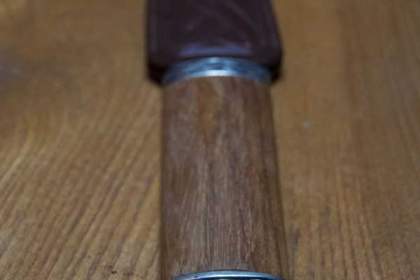 The day sgian dubh has a rosewood handle, leather sheath and steel blade. The glass containing ashes comes in blue, red or emerald, or a combination of colours.